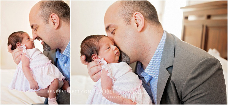 Daddy kisses baby girl