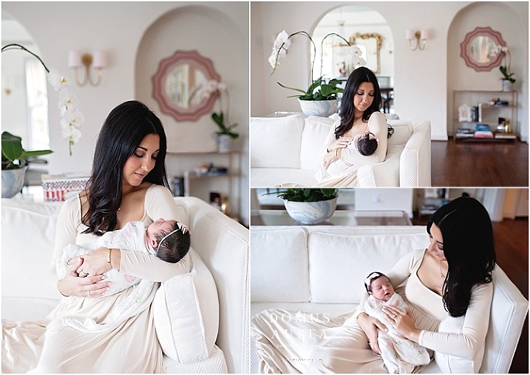 A beautiful mother looks at her newborn baby.