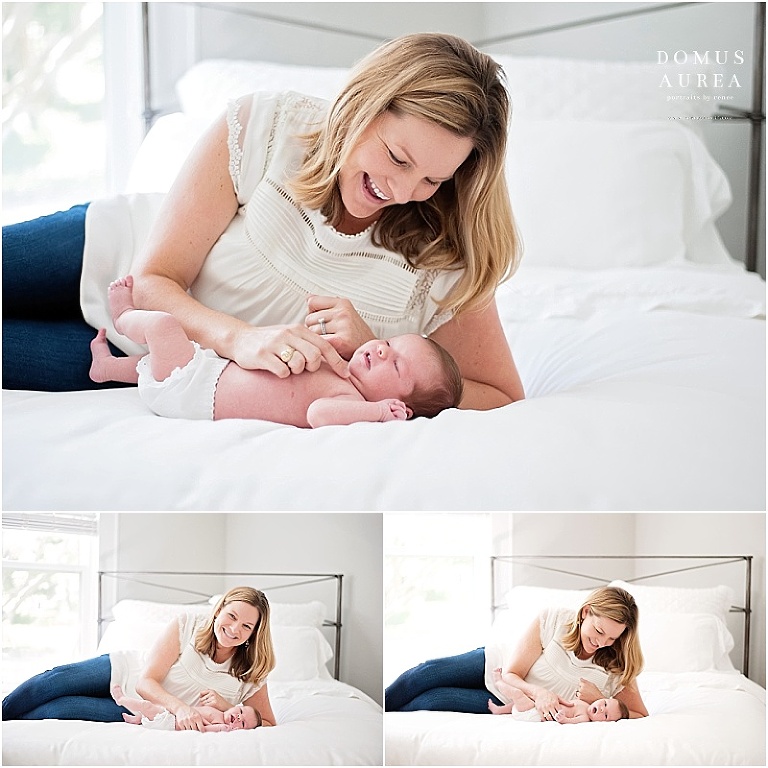 Mom looks lovingly at her newborn baby girl