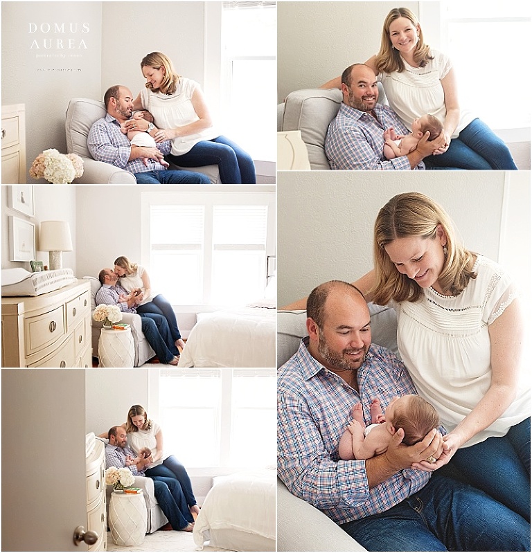 Mom and dad look lovingly at their newborn baby girl