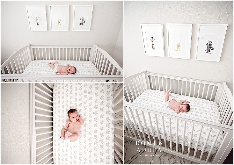 Newborn girl lays in her crib