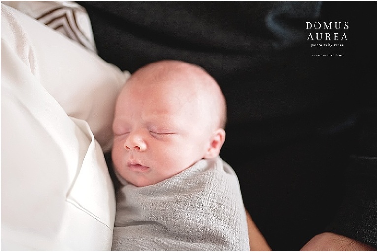 Newborn baby in swaddle