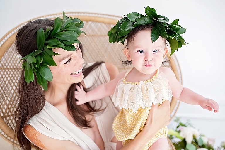 Gorgeous mama and her daughter smile for camera