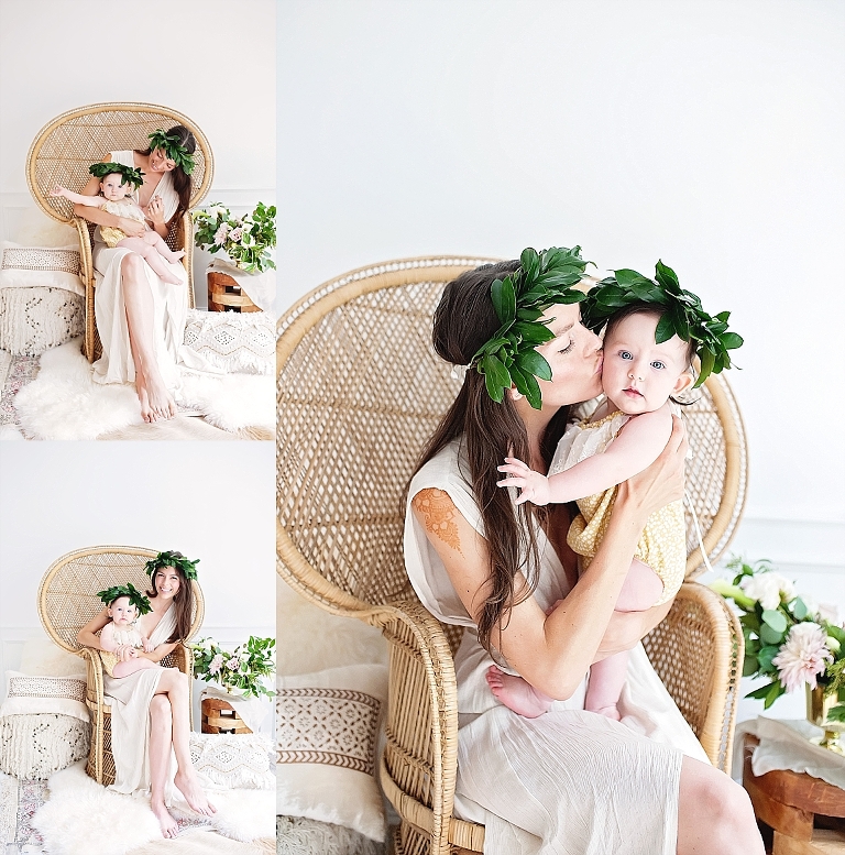 Beautiful mama and baby sit on chair