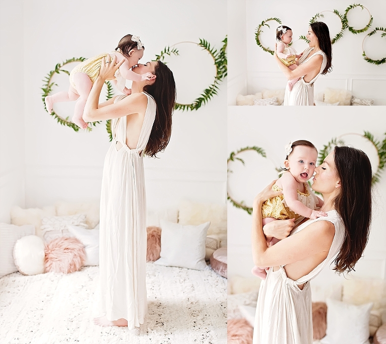 beautiful brown-haired mama and daughter pose for their photo