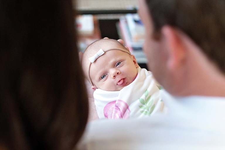 baby girl sticks her tongue out during session