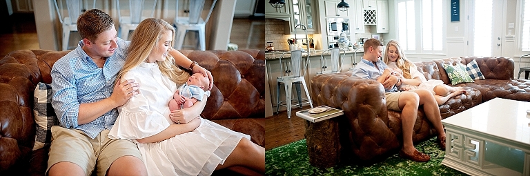 Mama and Daddy hold their newborn boy in their living room