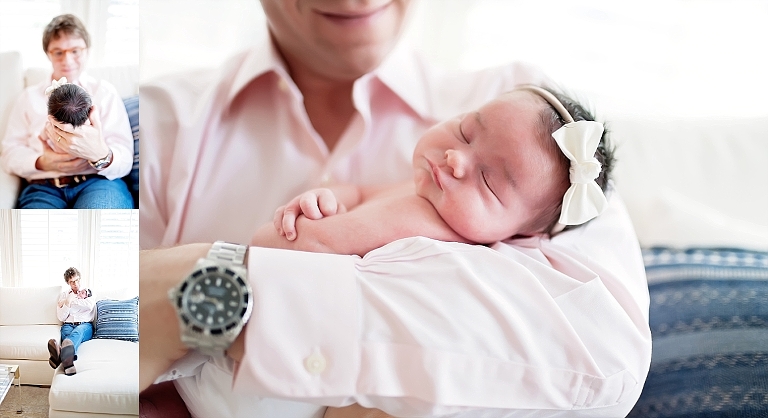 A sweet close up of newborn baby girl with her daddy