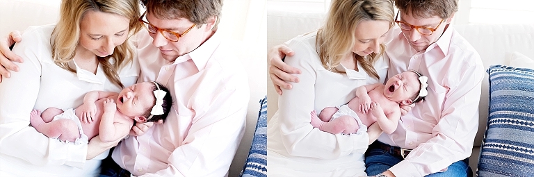 Mom and Dad snuggle their baby girl during session