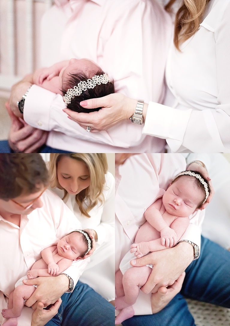 Sweet baby Caroline held by her mommy and daddy
