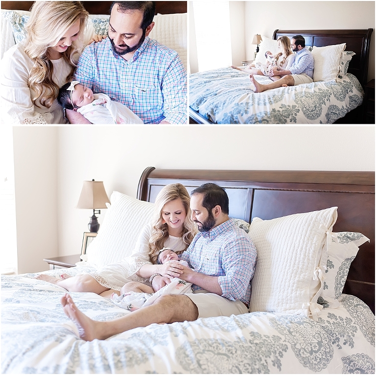 mom and dad sit on bed during their newborn session