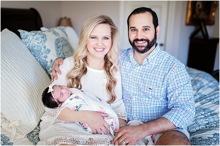 portait of mom, dad and newborn baby girl