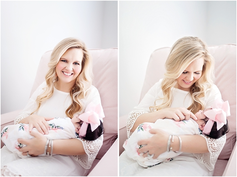 portrait of a mom holding her newborn girl