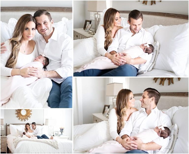 Mom and dad hold their daughter during the newborn session
