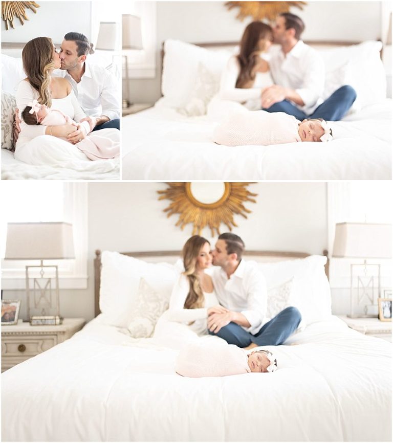 baby and parents on bed 