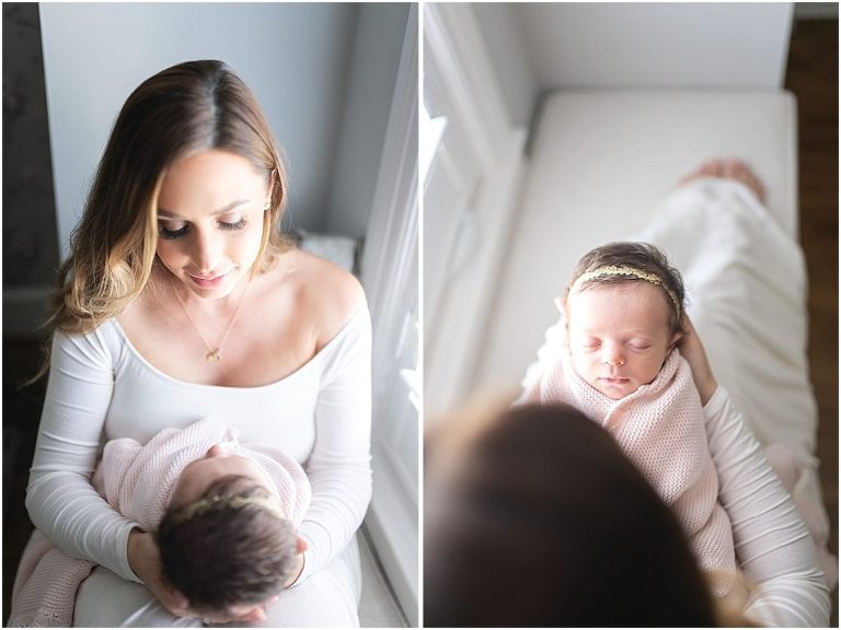 Mom holds her newborn daughter
