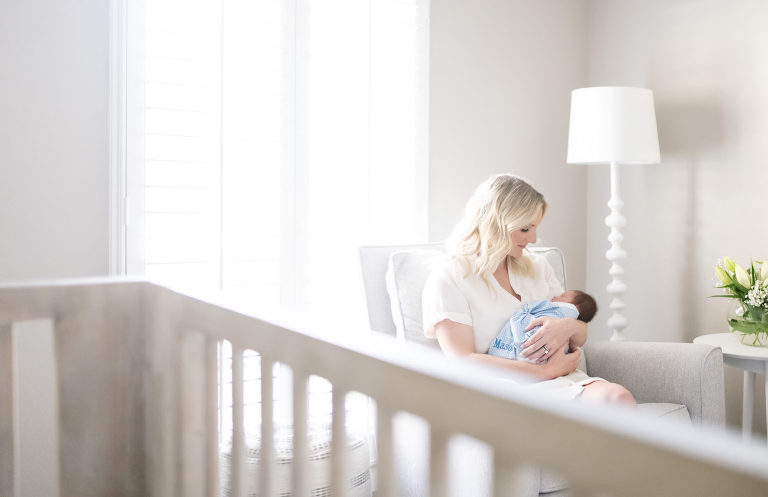mom looks at her newborn son