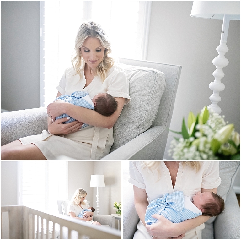 mom holds her newborn son in his nursery