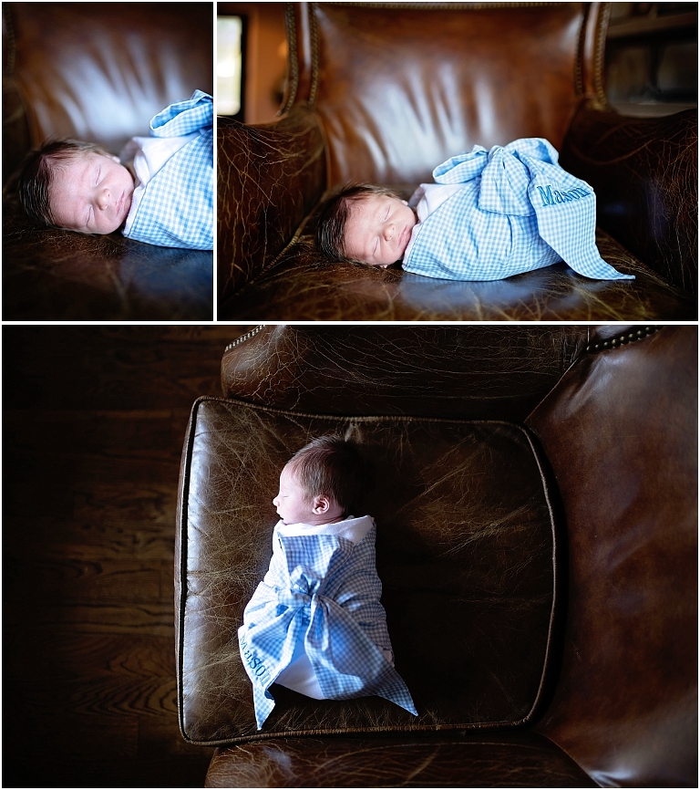 baby boy lays on a leather chair