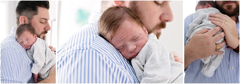 a dad holds his newborn son