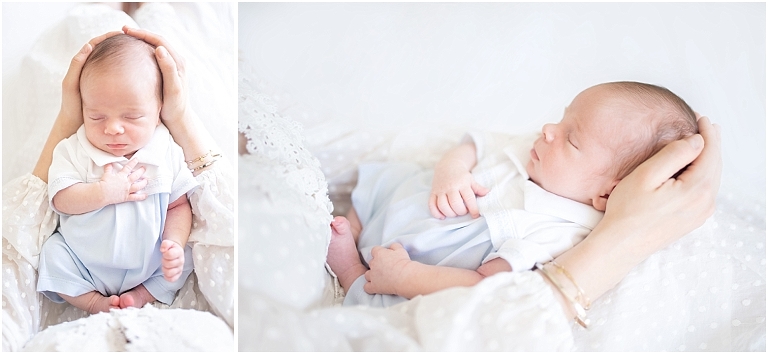 beautiful baby boy held by his mother