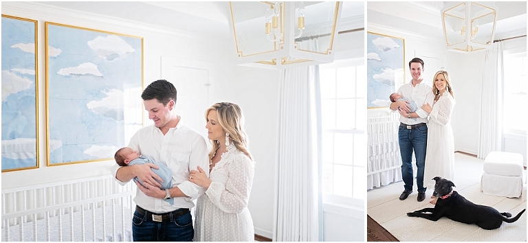 new parents look at their baby son