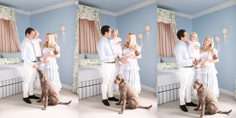 family looks at one another during newborn session