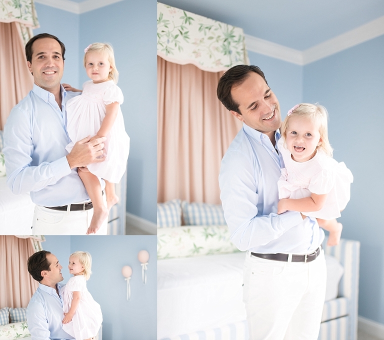 dad plays with his daughter during newborn session