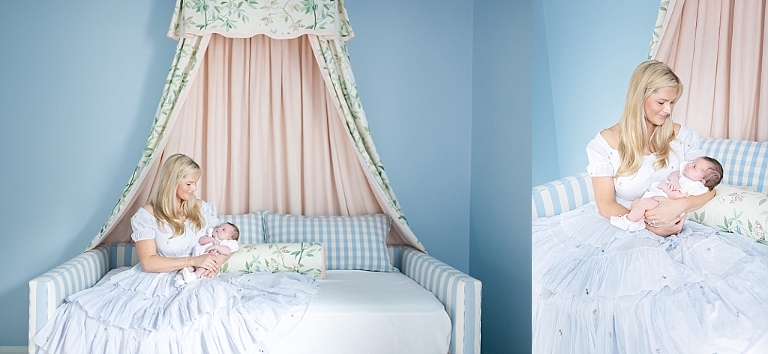 mom holds newborn daughter on daybed