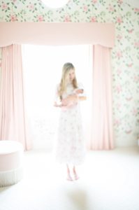 gorgeous out of focus ethereal photo of mother holding baby