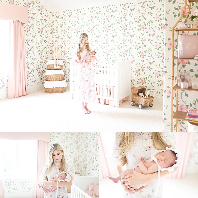 mom holds her little baby girl in floral nursery